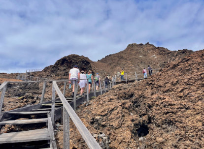 People climbing the stairway on Bartolome Island.